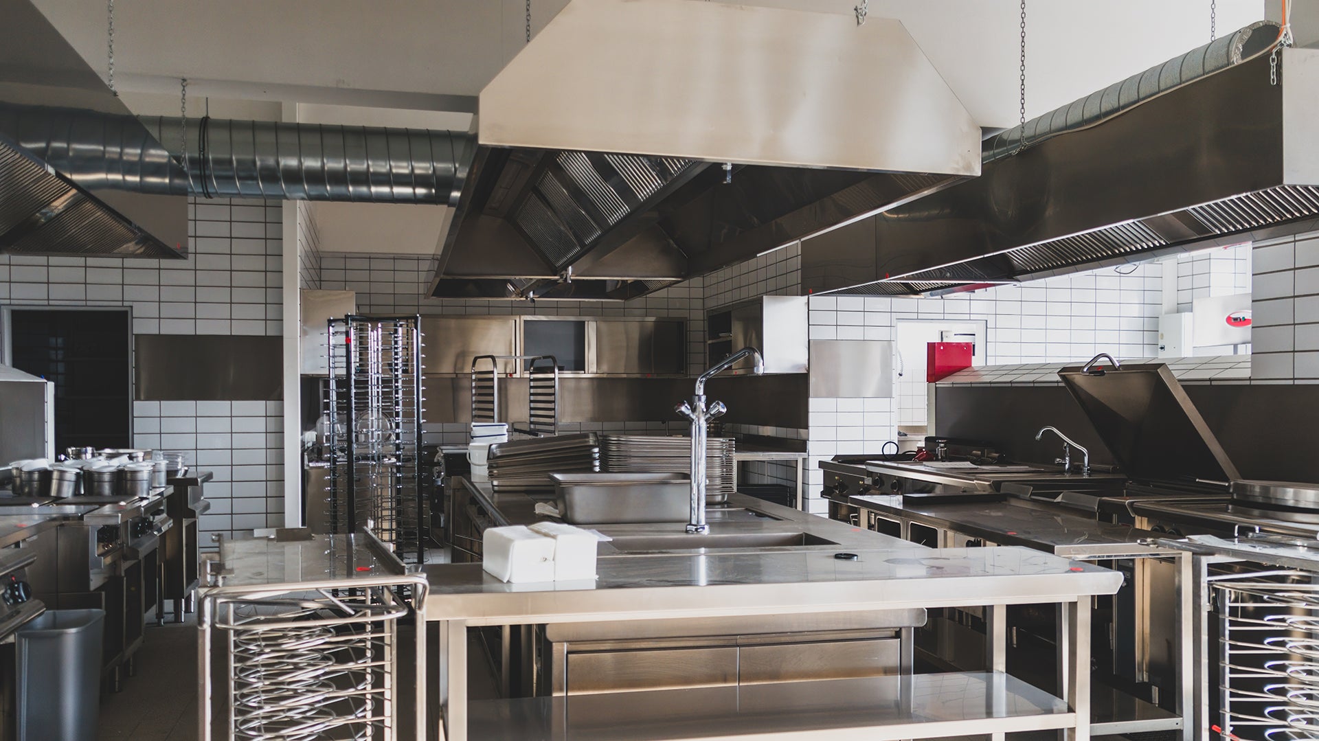 Commercial kitchen with equipment and appliances